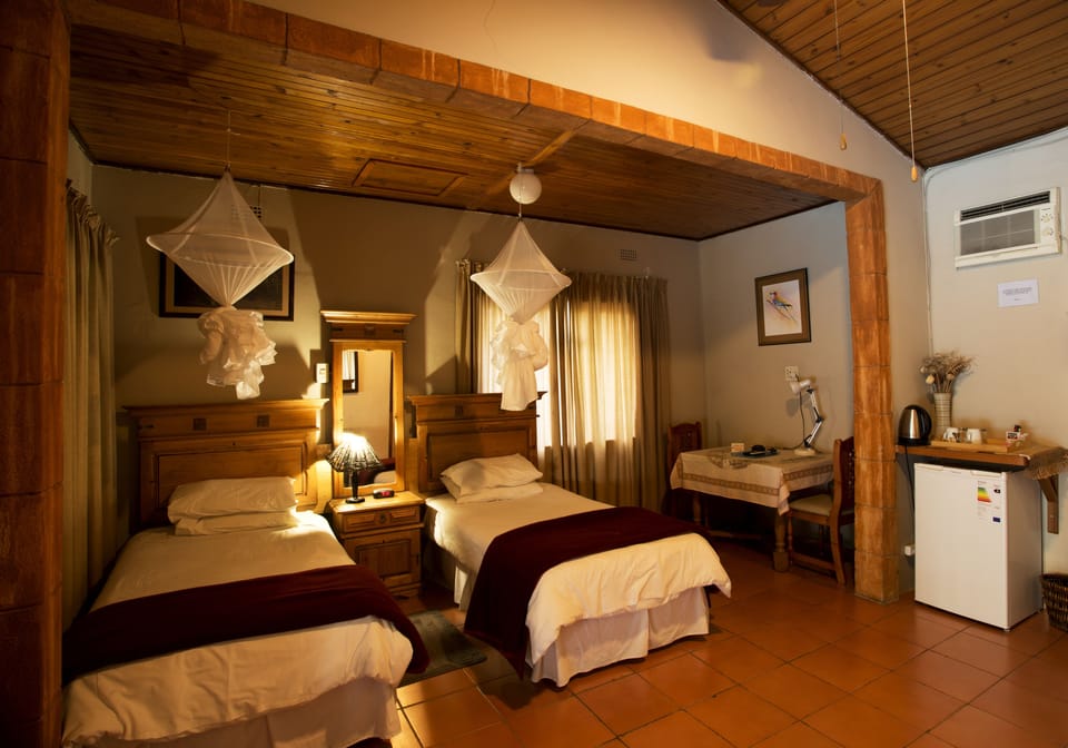 Double or Twin Room | 1 bedroom, in-room safe, desk, iron/ironing board (on request)