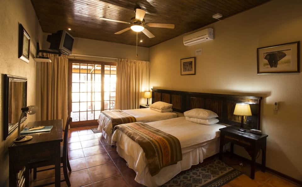 Double or Twin Room | 1 bedroom, in-room safe, desk, iron/ironing board (on request)