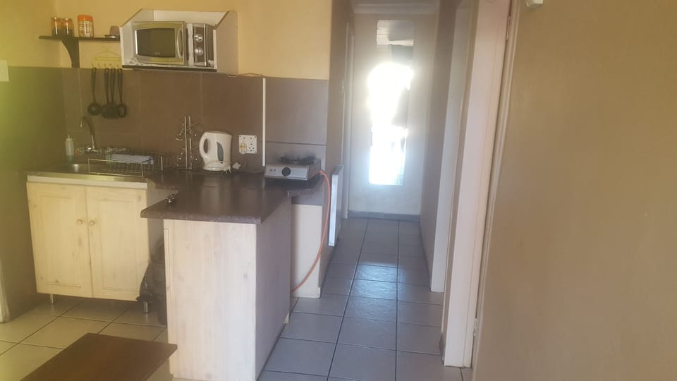 Economy Apartment, 2 Bedrooms (2 bathrooms & kitchen ) | Shared kitchen facilities | Electric kettle, cookware/dishes/utensils
