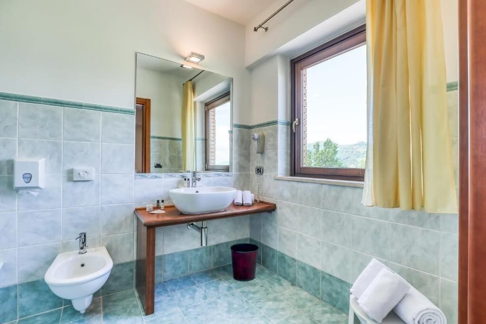 Superior Triple Room, Jetted Tub | Bathroom | Shower, free toiletries, hair dryer, slippers