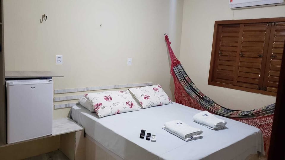 Basic Double Room | Minibar, iron/ironing board (on request), WiFi (free), bed sheets