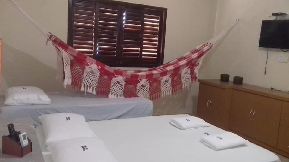 Minibar, iron/ironing board (on request), WiFi (free), bed sheets