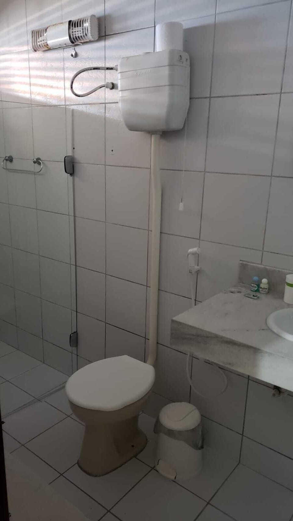 Shower, designer toiletries, towels