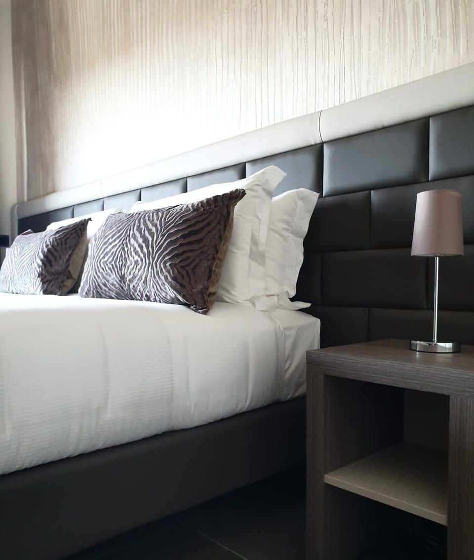 Superior Double or Twin Room | Minibar, in-room safe, desk, blackout drapes