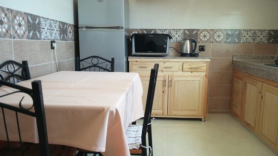 Apartment, 2 Bedrooms | Private kitchen | Fridge, microwave, stovetop, electric kettle