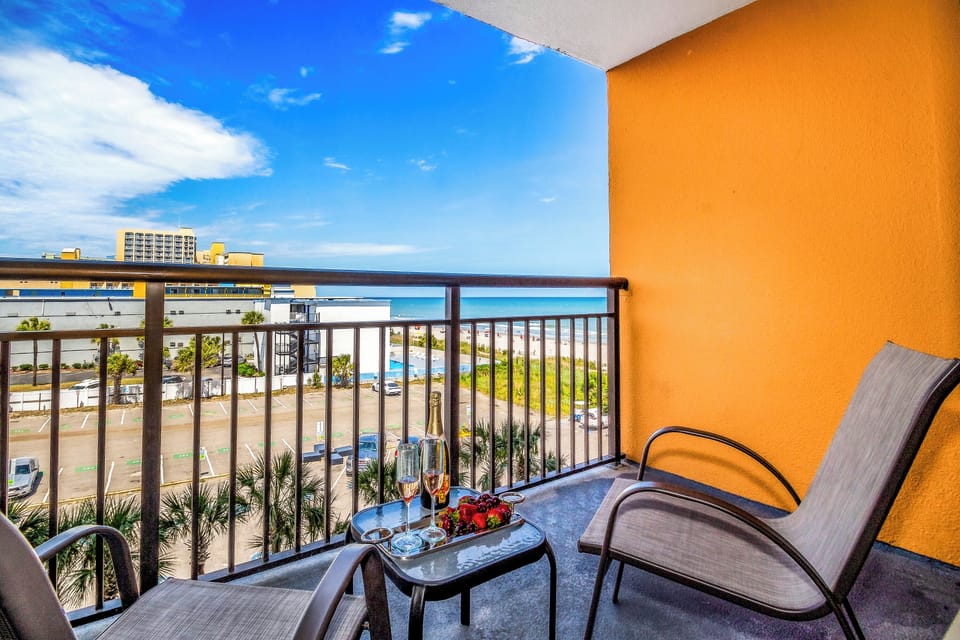 Enjoy the fresh air and sunshine in this cozy balcony!