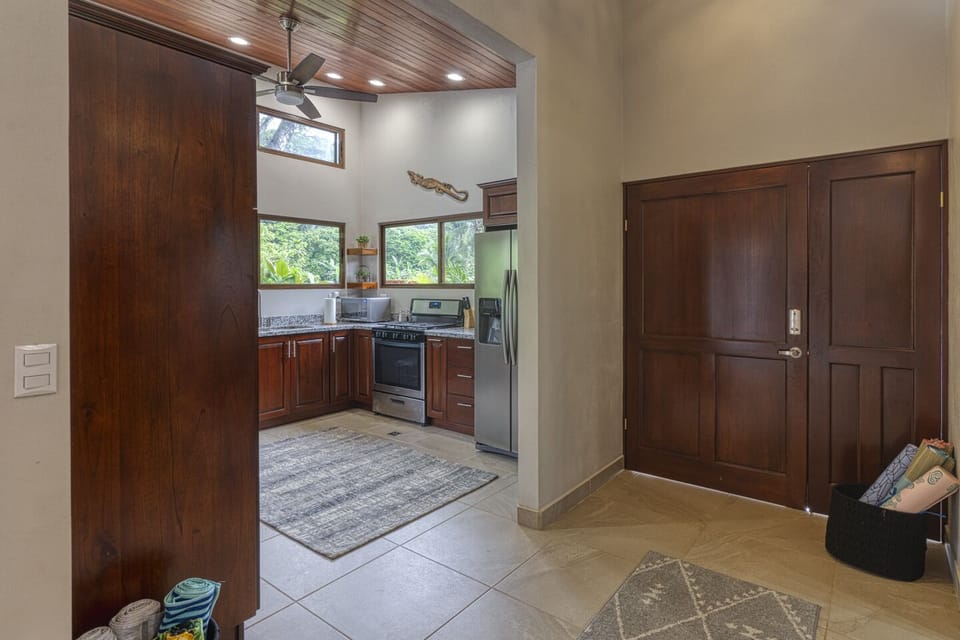 Front door, kitchen view.