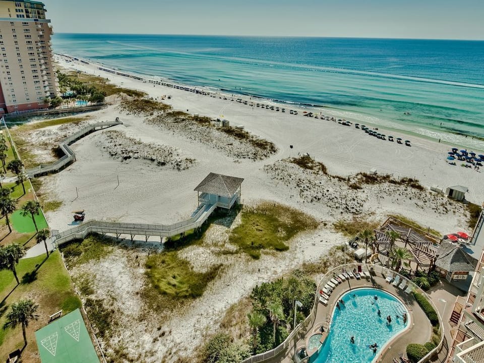 Views of the gulf, beach, dunes and pool from your private balcony