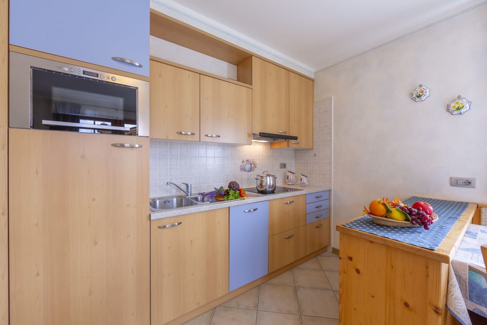 Kitchen with fridge and dishwasher