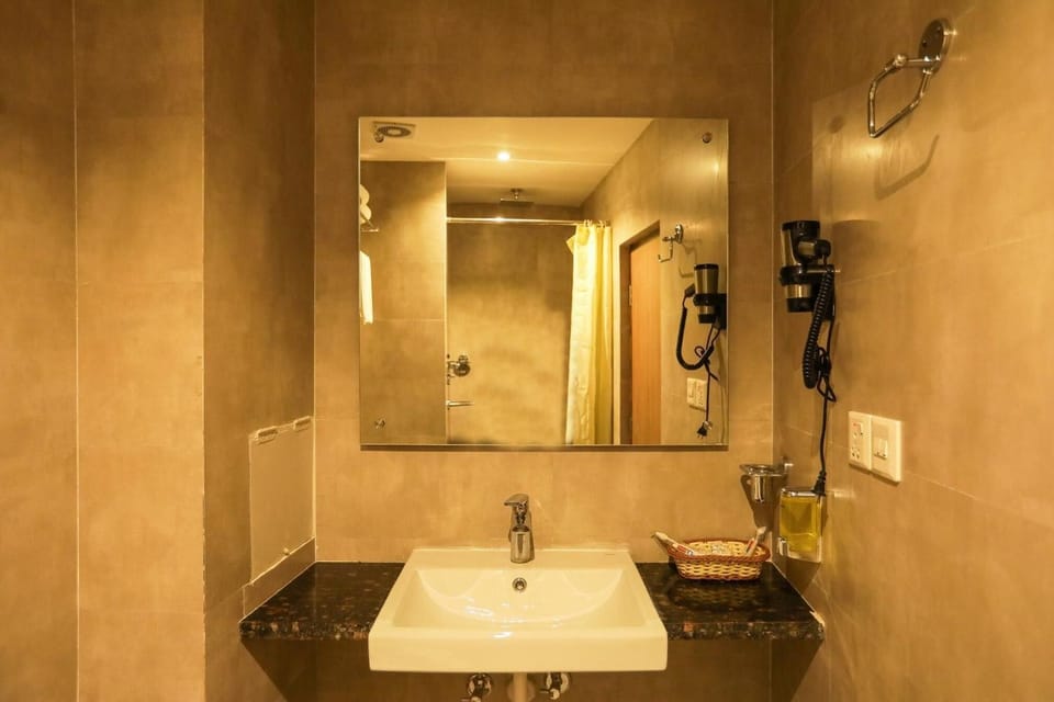 Shower, hydromassage showerhead, slippers, towels