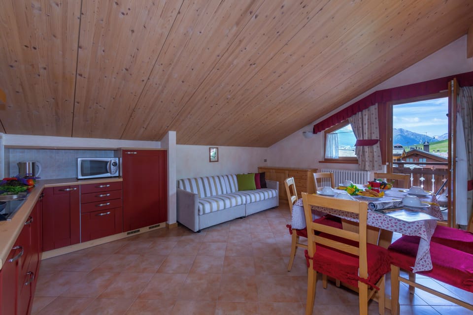 Living room with kitchen and dining area