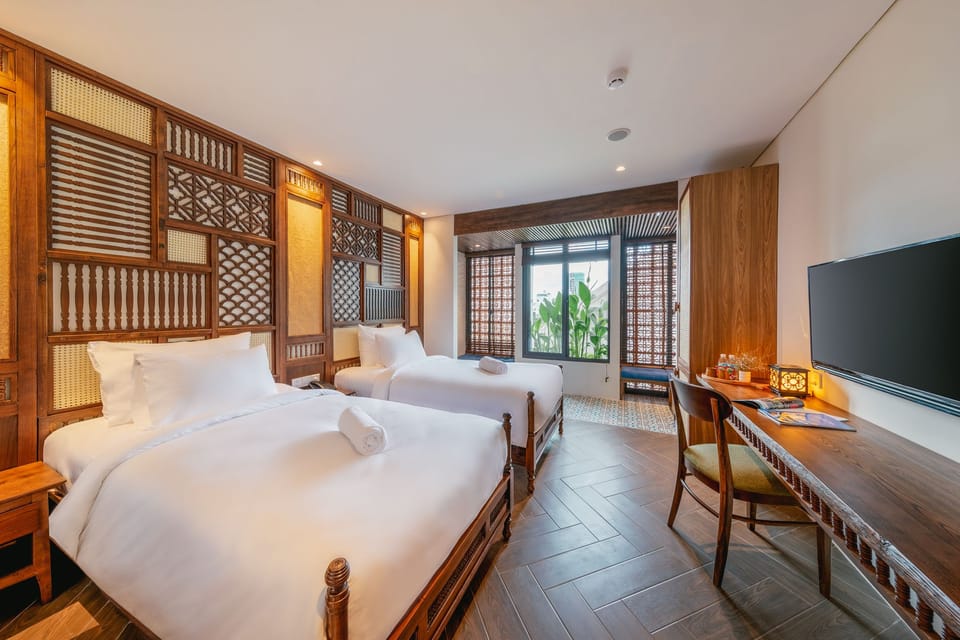Deluxe Twin Room | Minibar, desk, blackout drapes, iron/ironing board (on request)