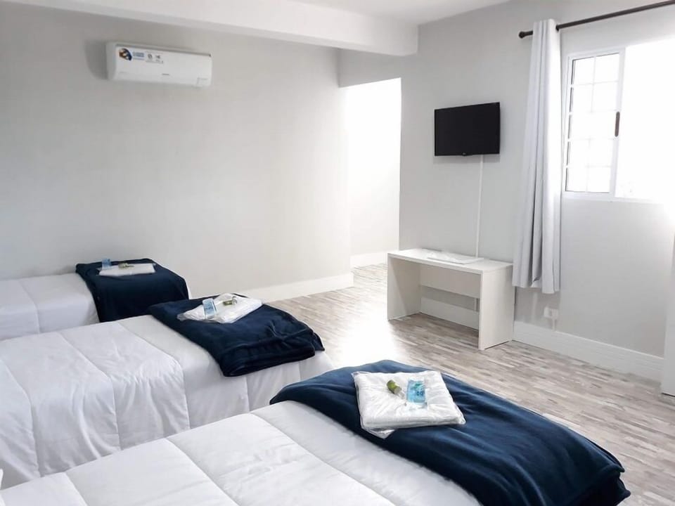 Family Room | Hypo-allergenic bedding, pillowtop beds, laptop workspace