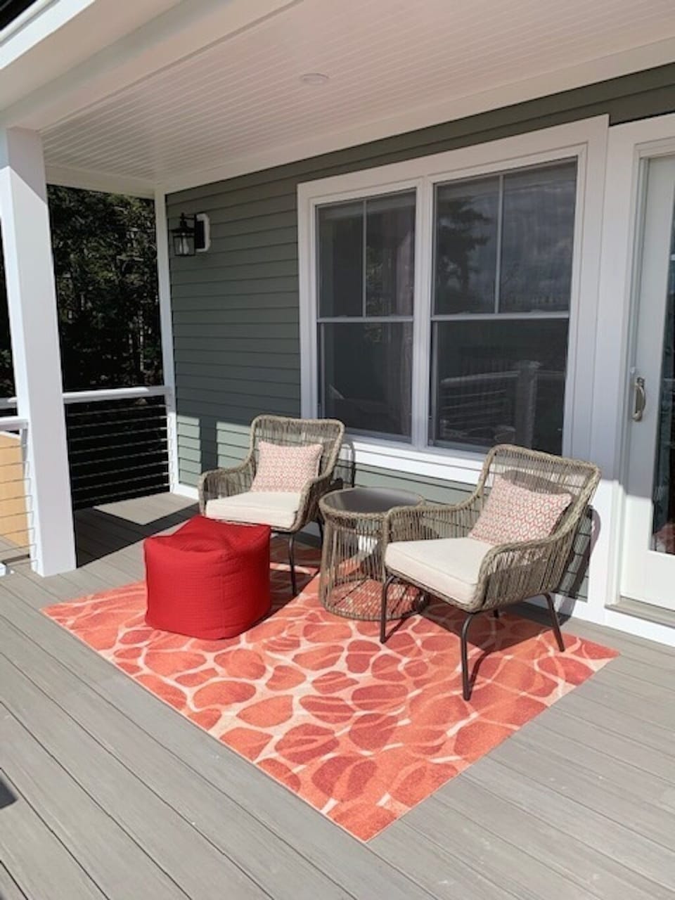 Partially covered deck overlooking the water