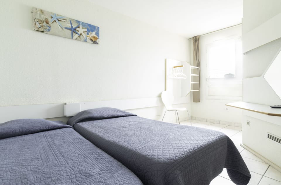 Desk, soundproofing, iron/ironing board, free cribs/infant beds