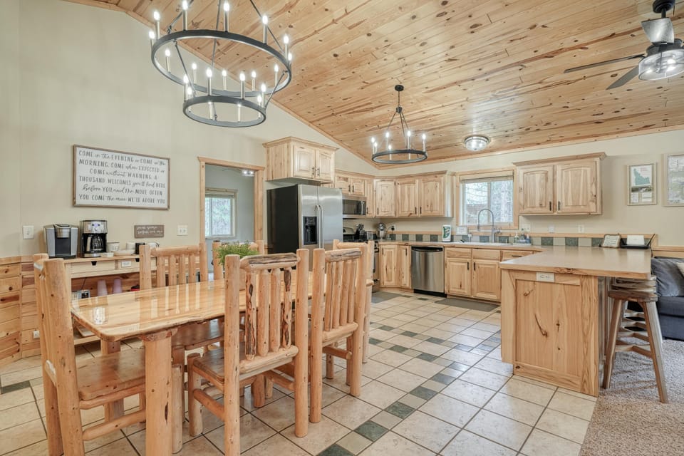 Dining room, kitchen, and complimentary coffee bar. 