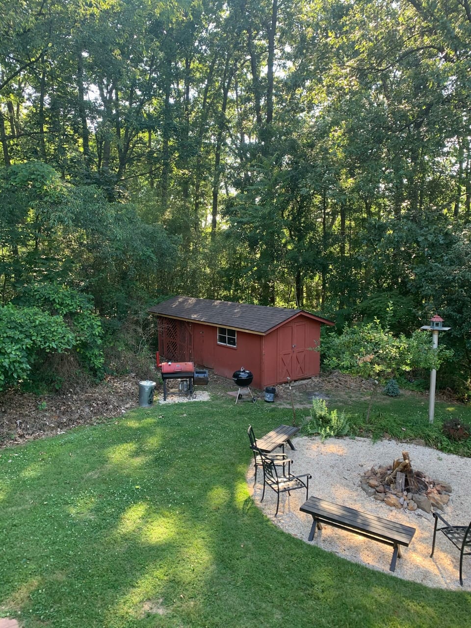 Fire pit and two charcoal grills
