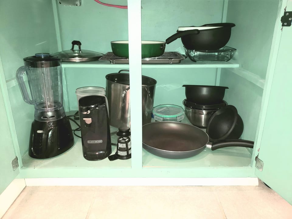 Lightly Stocked with Pots, Pans, Mixing 
Bowls, Blender, Can Opener....
