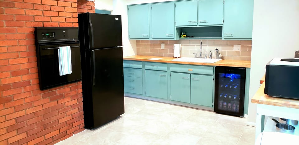 Kitchen:
Lightly stocked with all essentials
-Mini Fridge- Soda & Water 
