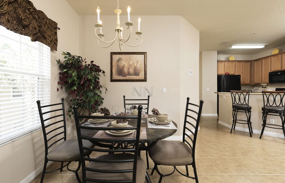 Enjoy intimate meals at the dining table designed for four