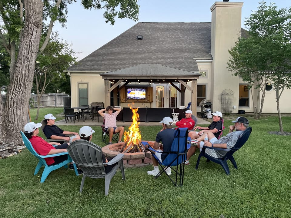 Awesome backyard space with firepit/huge patio/TV/pergola/strong lights/grill