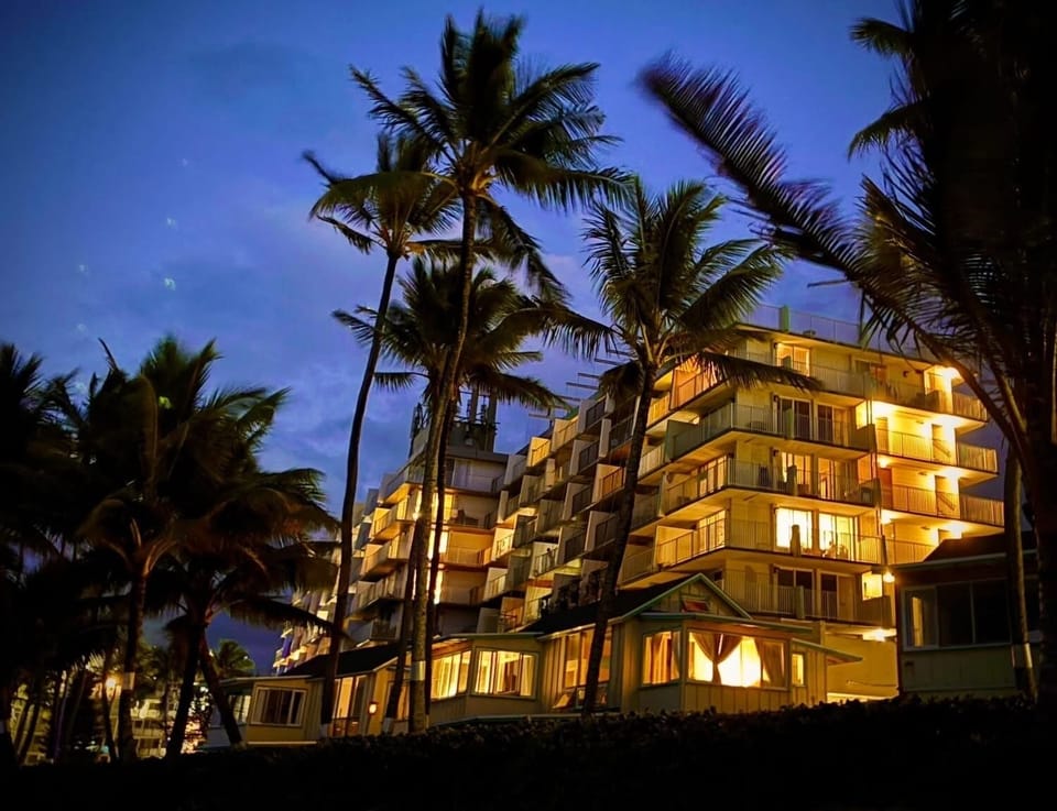 Beautiful condo front in evening.