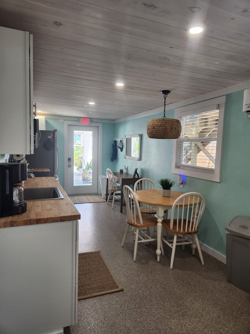 Dining table and desk area (background)