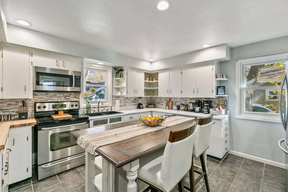 Fully stocked kitchen with stainless steel appliances including a dishwasher!