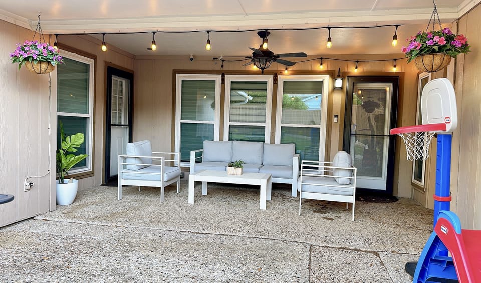 Patio table in the backyard.  Connected to the living room and Master bedroom.