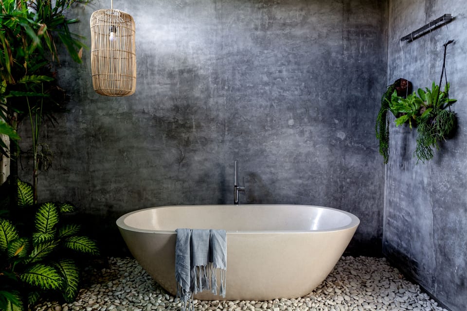En-suite bathroom with bathtub