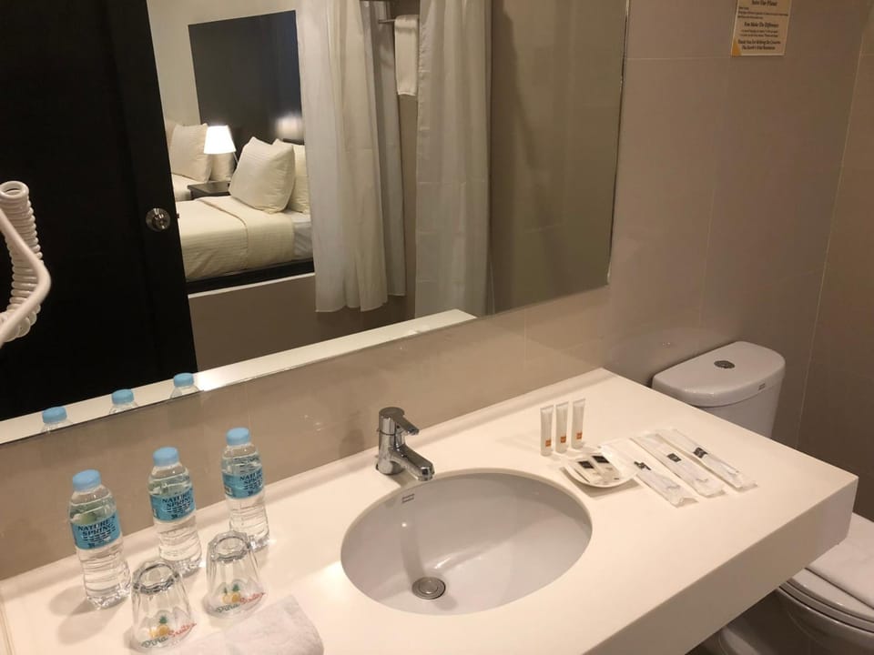 Shower, free toiletries, hair dryer, slippers