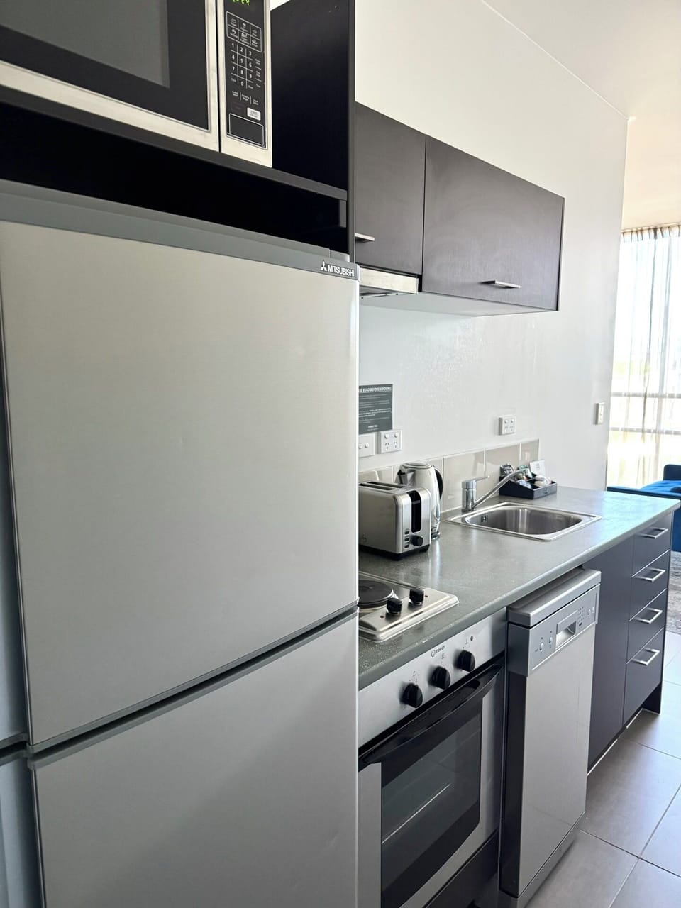 Apartment, 1 Bedroom | Private kitchen | Full-size fridge, microwave, stovetop, dishwasher