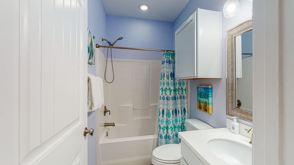 Shared bathroom with Tub/Shower Combo