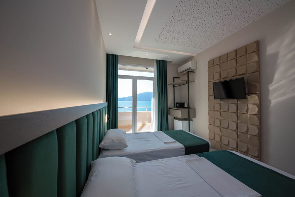 Family Suite, Balcony, Sea View | In-room safe, desk, blackout drapes, soundproofing