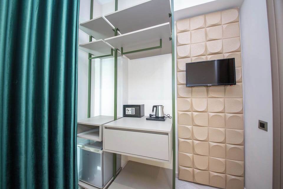 Double Room, Balcony, Partial Sea View | In-room safe, desk, blackout drapes, soundproofing
