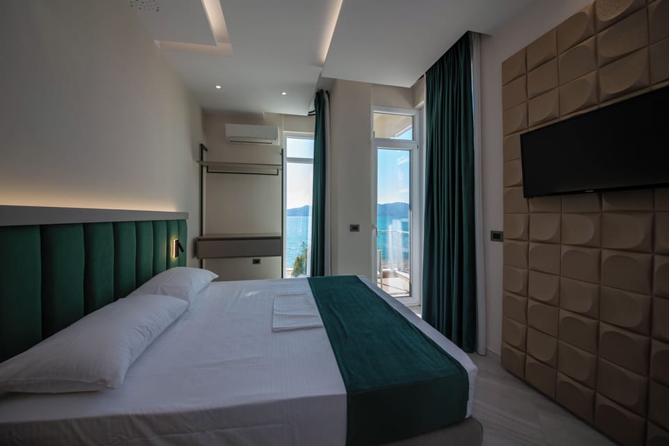 Family Suite, Balcony, Sea View | In-room safe, desk, blackout drapes, soundproofing