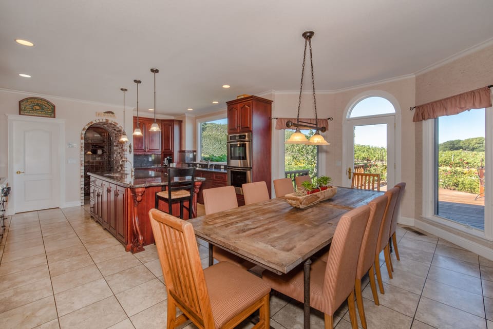 Dine together inside or outside overlooking the vineyards behind our home.