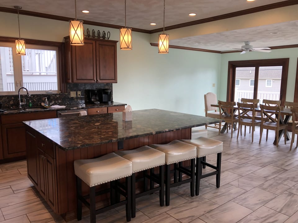 large second floor open concept kitchen/dining/living room