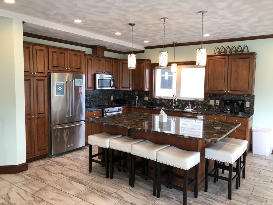 large second floor open concept kitchen/dining/living room