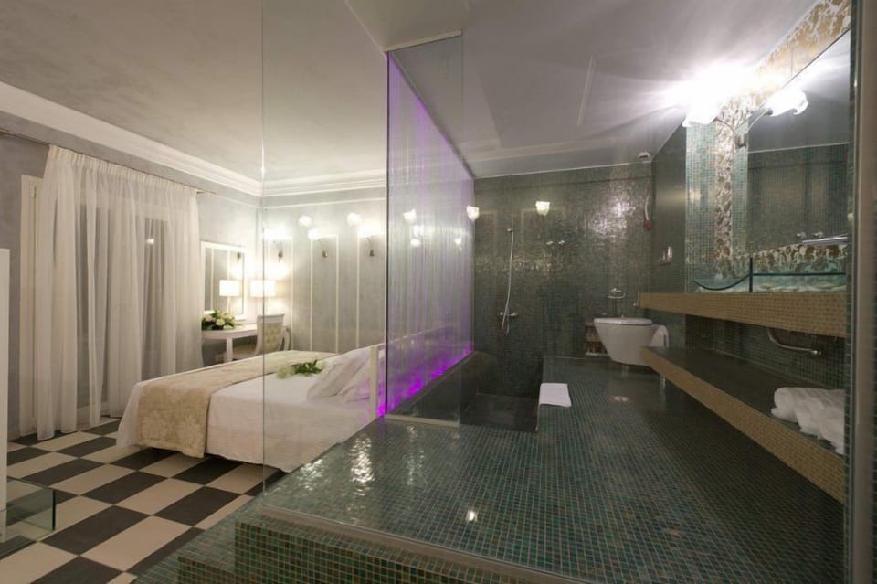 Superior Suite, Sea View | Minibar, in-room safe, individually decorated, individually furnished