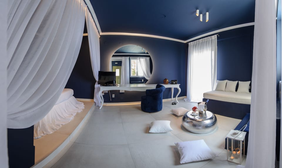Honeymoon Suite, Jetted Tub, Sea View | Minibar, in-room safe, individually decorated, individually furnished