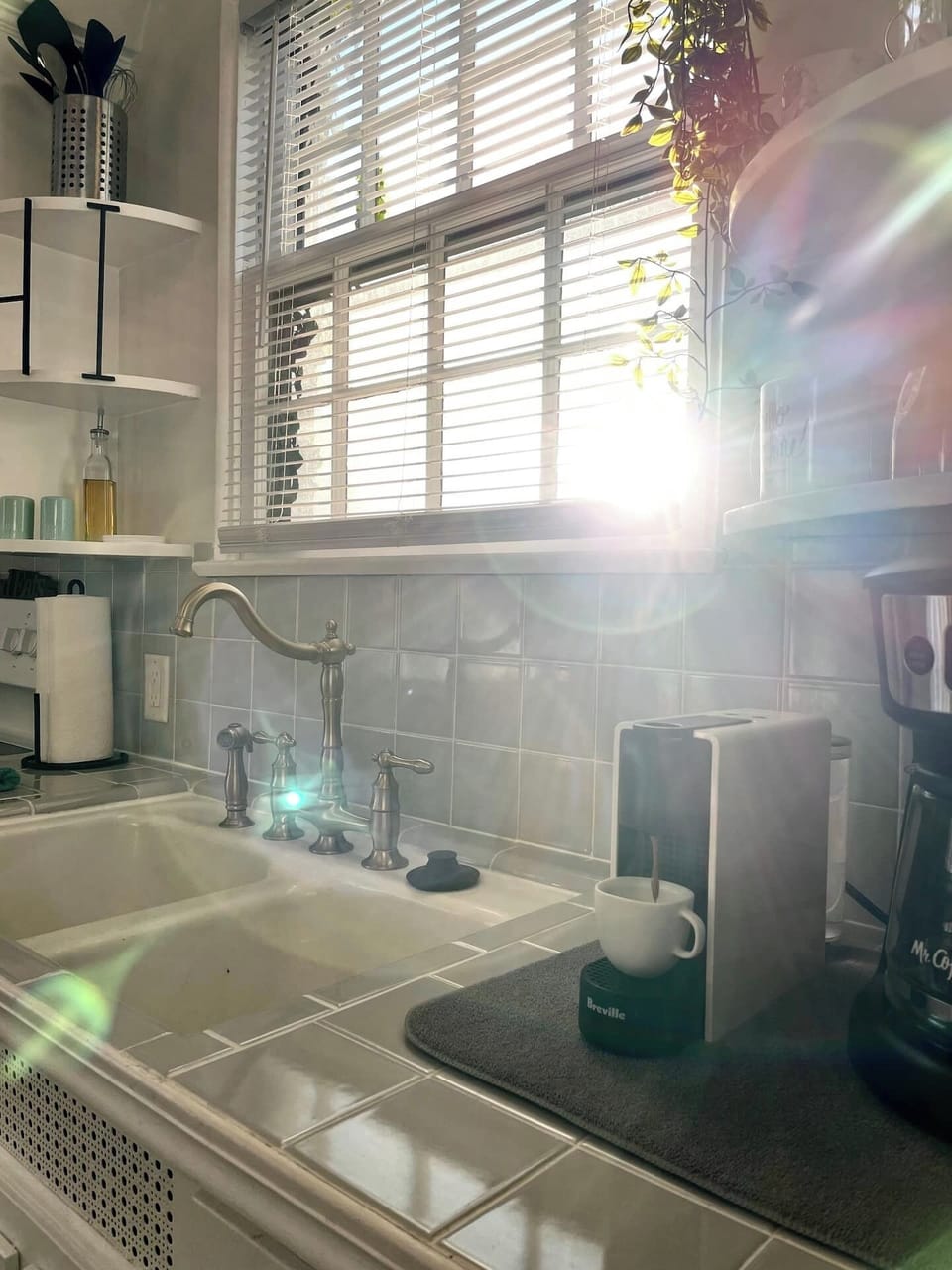 Kitchen - includes cooking utensils, pots, pans, etc. Oh did I mention there is a Mini Essenza Nespresso maker with complimentary pods provided? And a coffee bar?! 