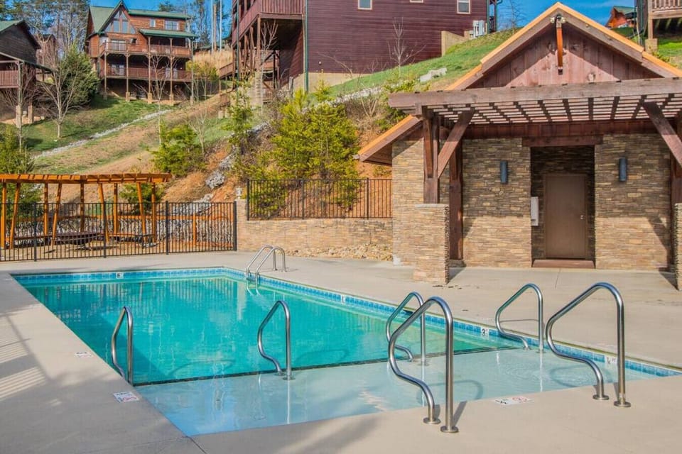 Take a dip in the cool, refreshing (and complimentary) Bear Cove Falls pool!