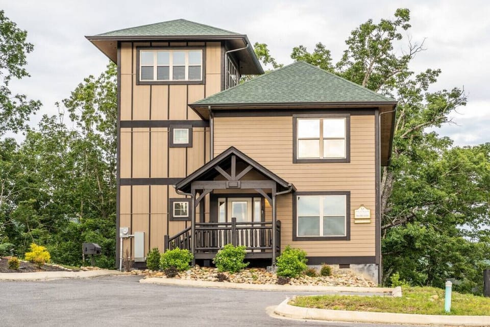 Your perfect Pigeon Forge vacation awaits in this luxurious 4 bedroom, 3 bath cabin that comfortably sleeps 13!
