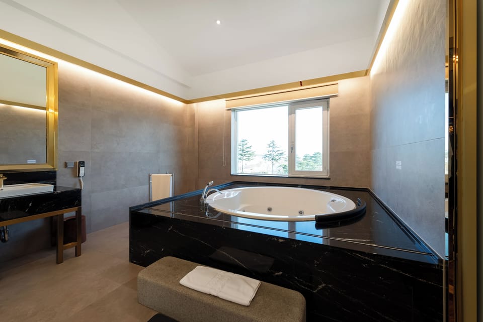 Park Boutique Premium | Bathroom | Shower, hair dryer, bathrobes, slippers