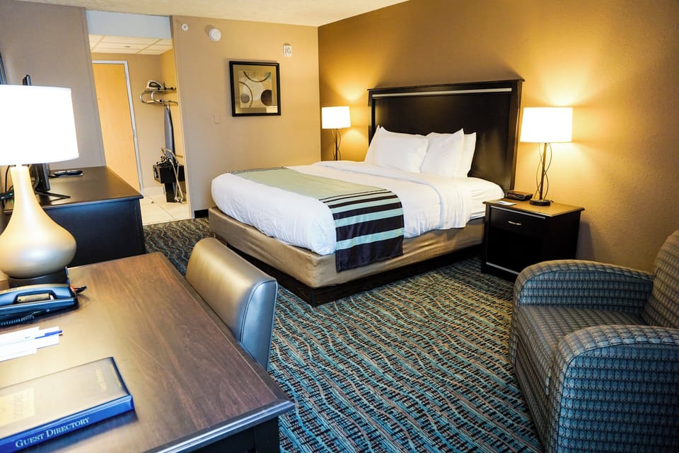 Premium bedding, desk, blackout drapes, iron/ironing board