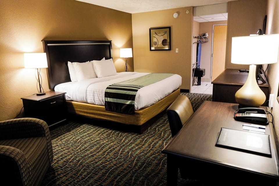 Premium bedding, desk, blackout drapes, iron/ironing board