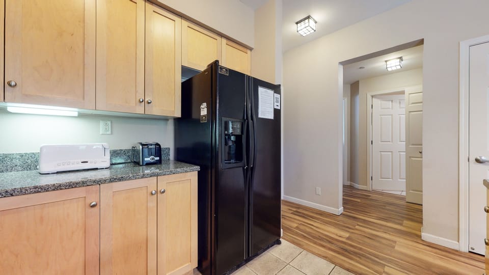 Condo, 2 Bedrooms | Private kitchen | Fridge, microwave, dishwasher, coffee/tea maker