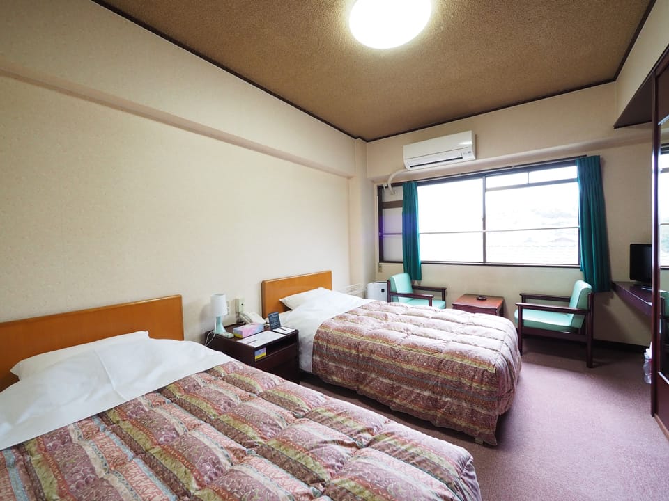 Desk, blackout drapes, free WiFi, bed sheets