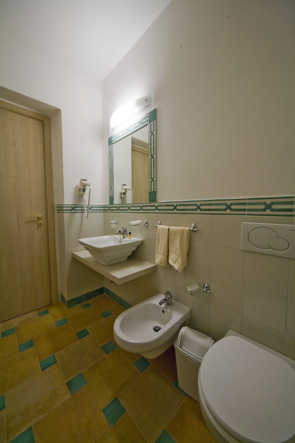 Shower, free toiletries, hair dryer, slippers